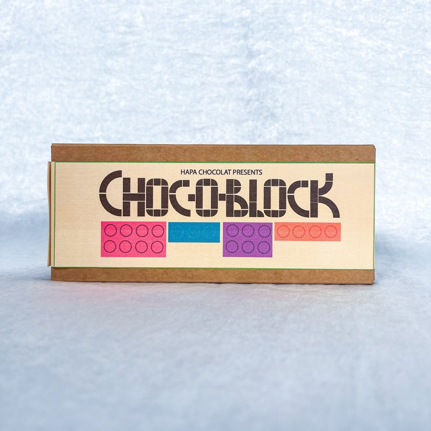 A brown box with a colorful label.