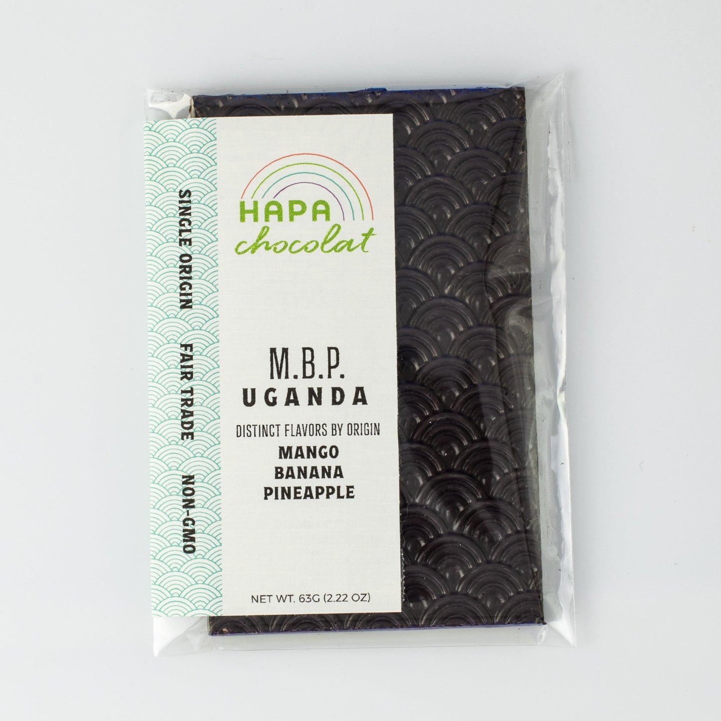 A seigaiha pattern dark chocolate bar in an eco-cello bag with an ivory colored label with the logo and product descriptions.