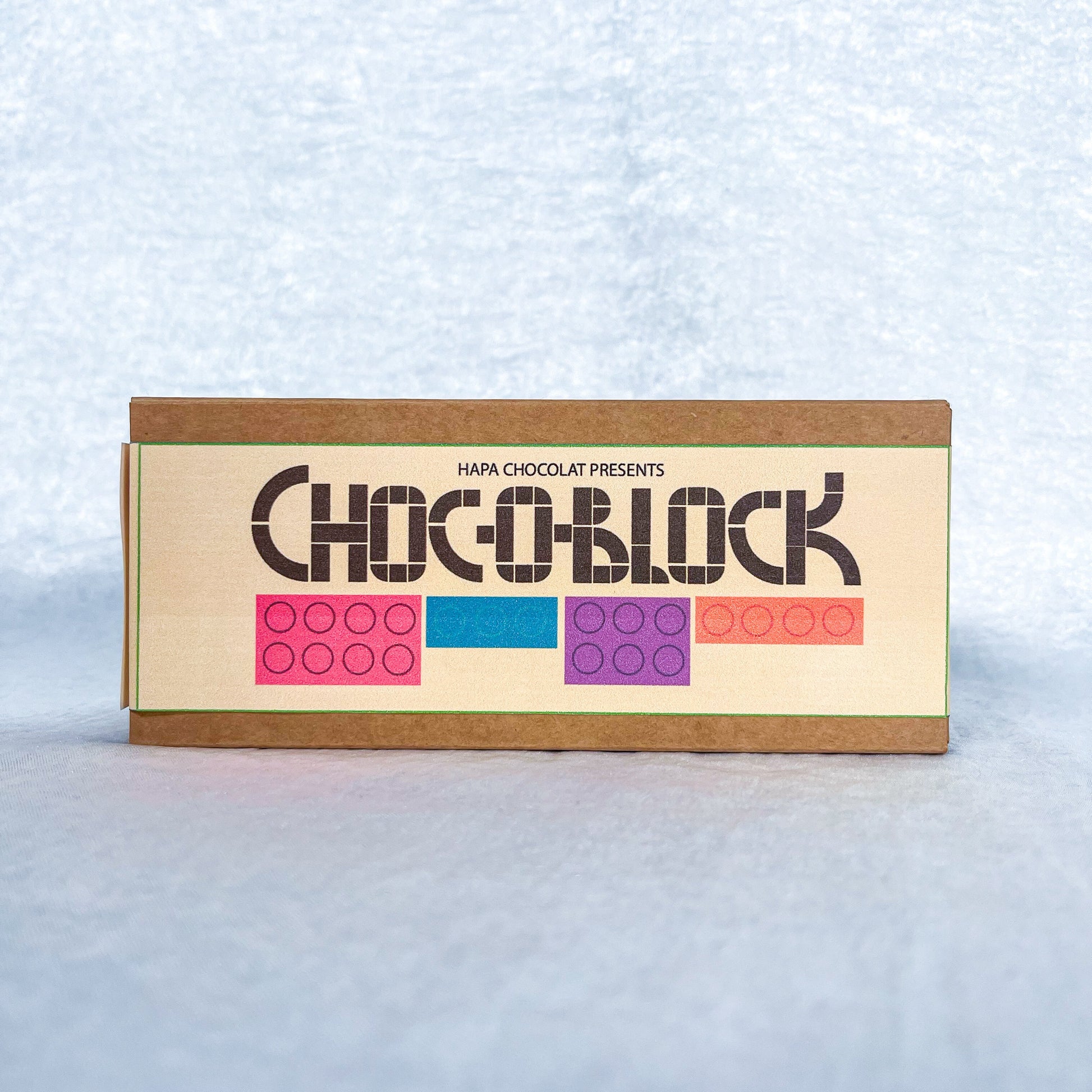 Brown box with a colorful label.
